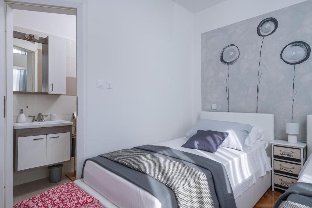 Postel nebo postele na pokoji v ubytování Villa Daniel