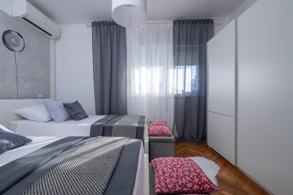 Postel nebo postele na pokoji v ubytování Villa Daniel
