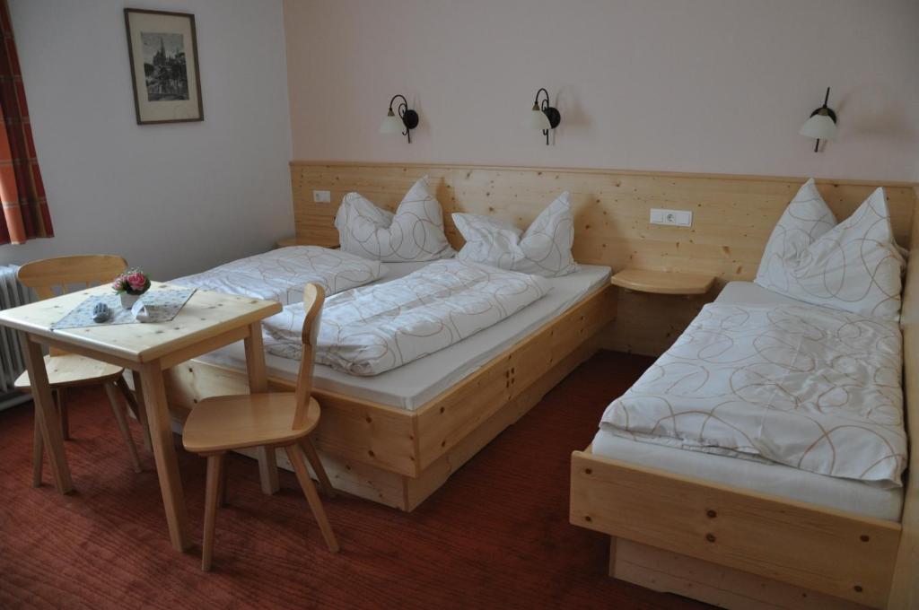 Postel nebo postele na pokoji v ubytování Triebenerhof