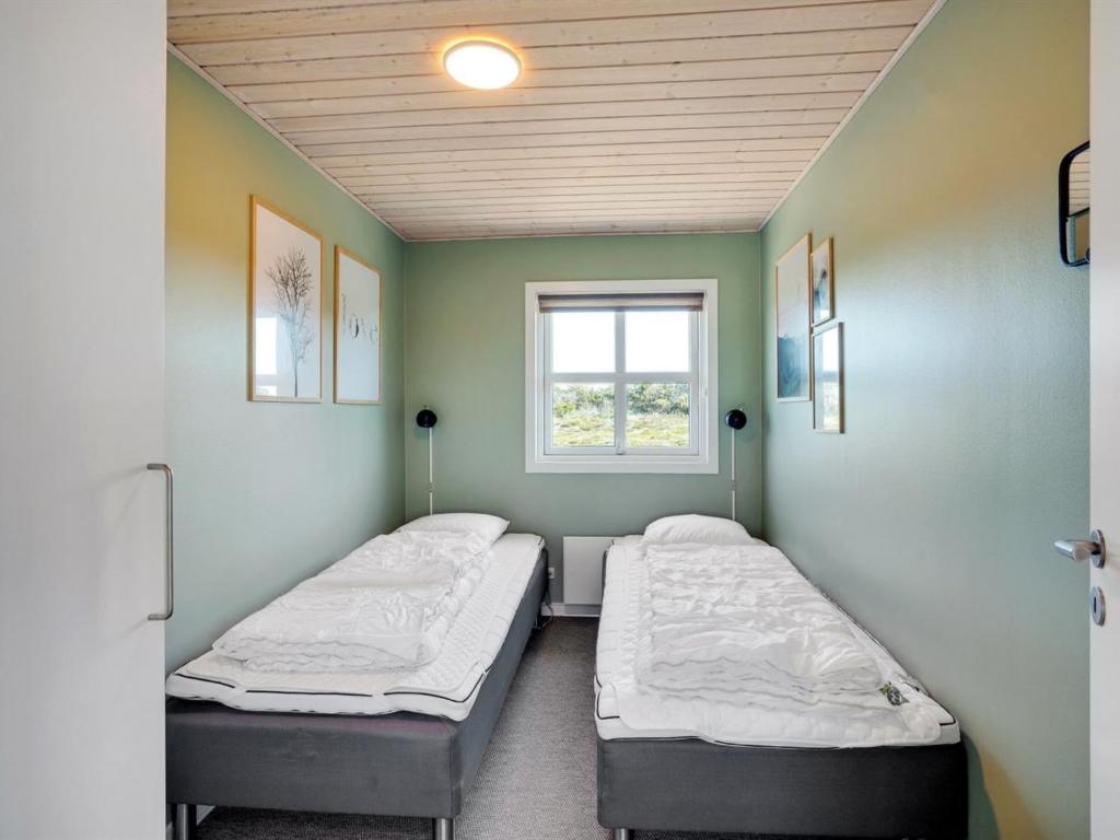 Postel nebo postele na pokoji v ubytování Holiday Home Eliena - 500m from the sea by Interhome