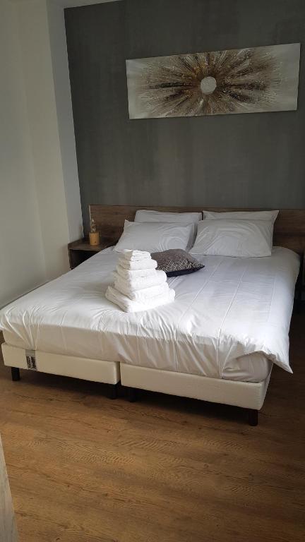 Posteľ alebo postele v izbe v ubytovaní Suite Deluxe, voyages d'affaires.