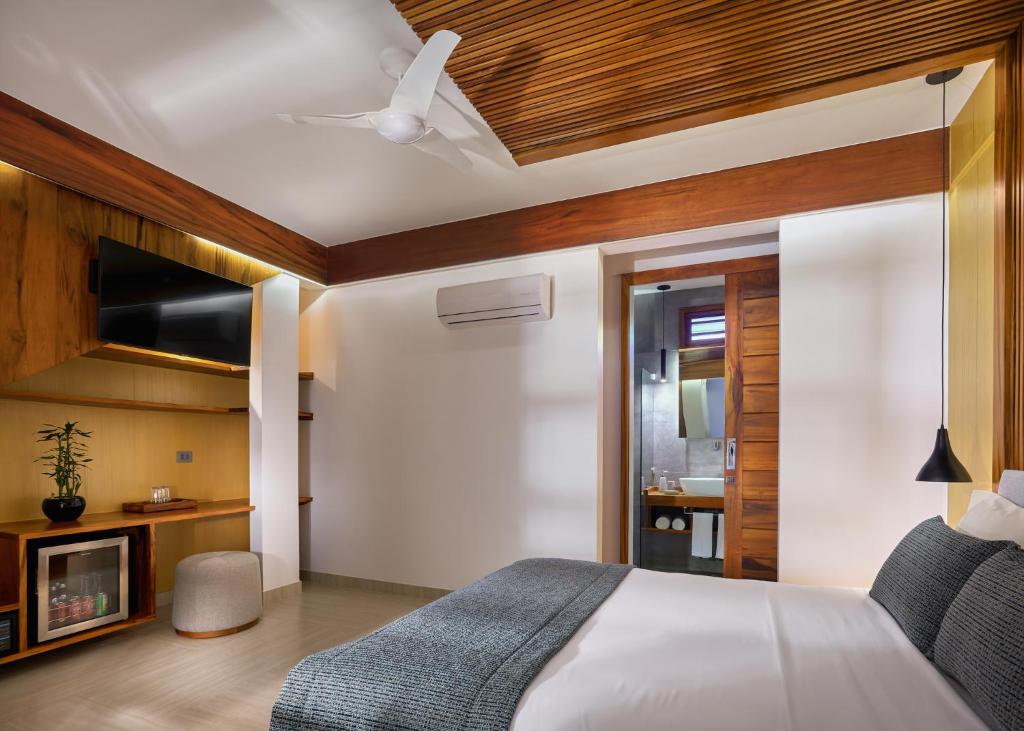 Postel nebo postele na pokoji v ubytování Villa Nautica Boutique Hotel