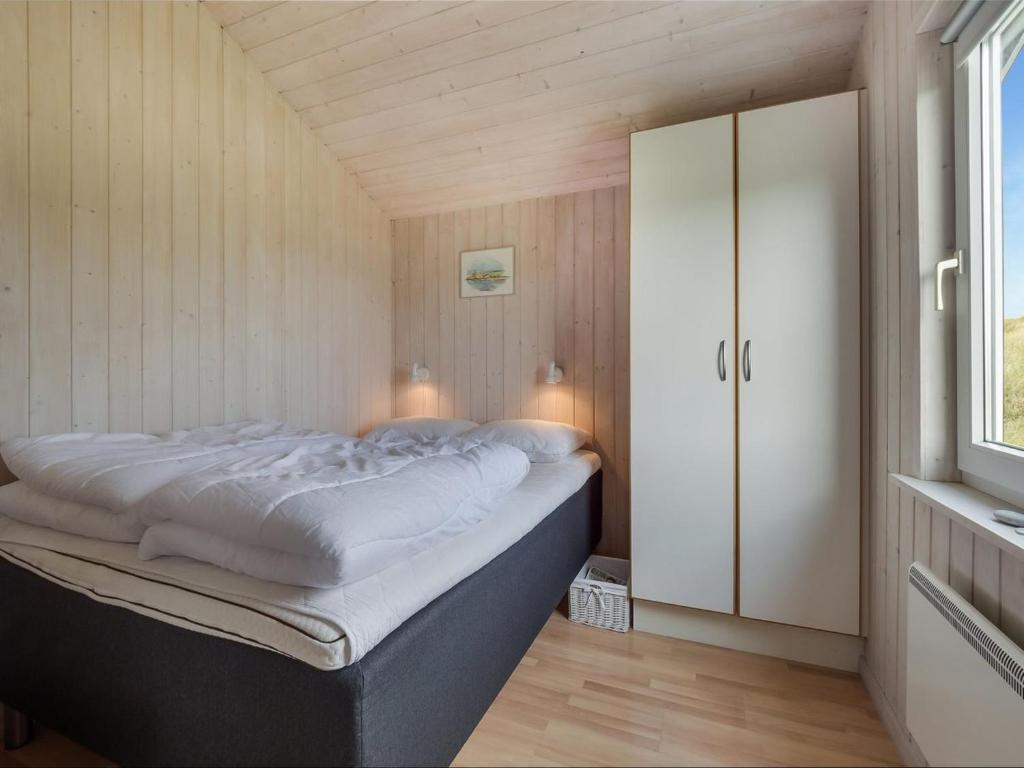 Postel nebo postele na pokoji v ubytování Holiday Home Suometar - 400m from the sea by Interhome