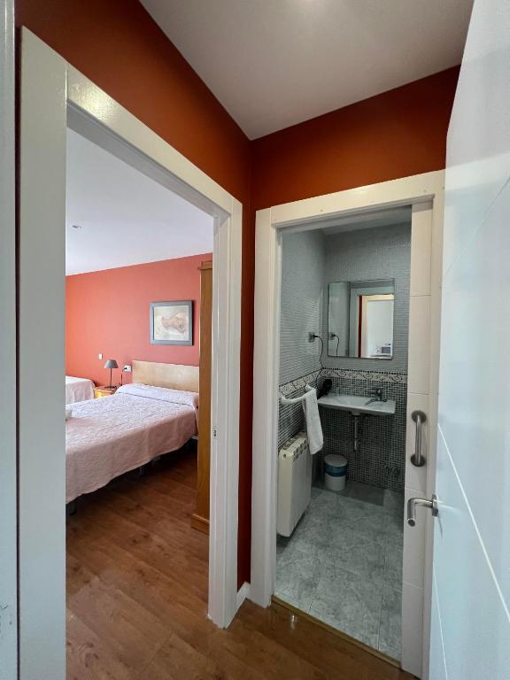 A bed or beds in a room at Complejo la Regalina