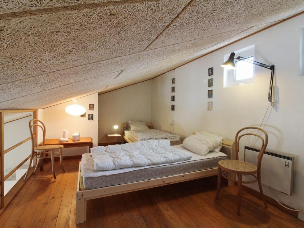Postel nebo postele na pokoji v ubytování Apartment Salka - 150m from the sea by Interhome