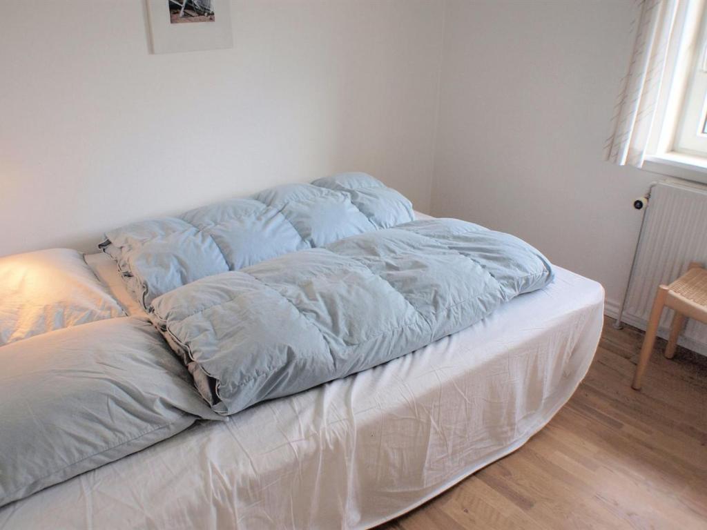 Postel nebo postele na pokoji v ubytování Apartment Britta - 100m from the sea by Interhome