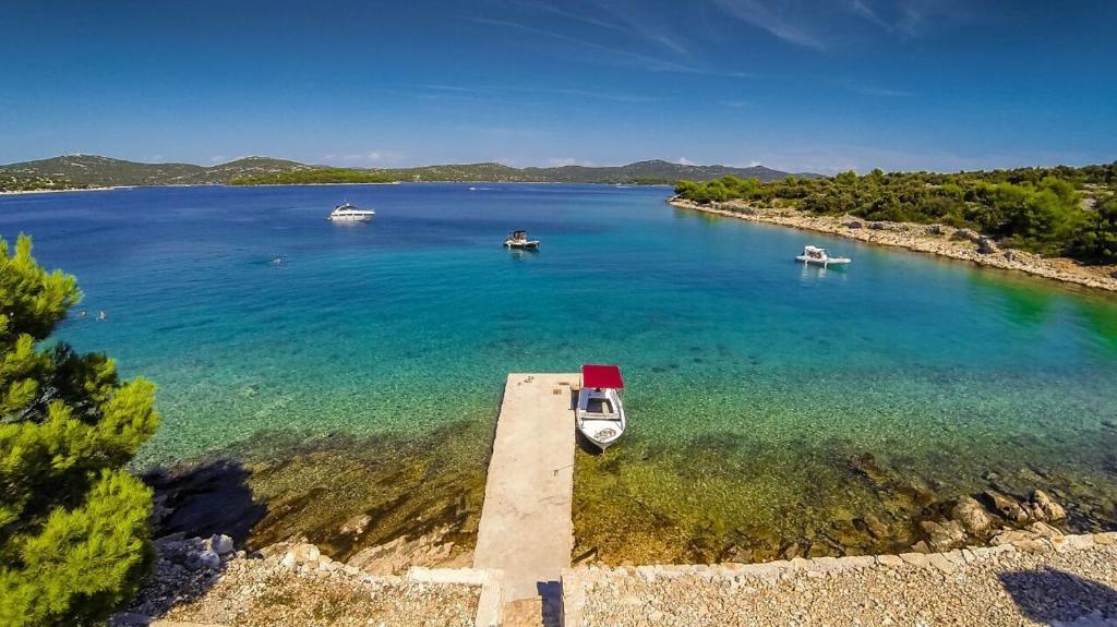 Stone house with a boat