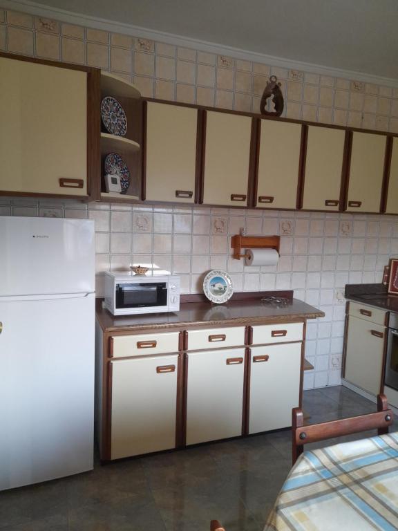 Kuchyň nebo kuchyňský kout v ubytování Casa Pili