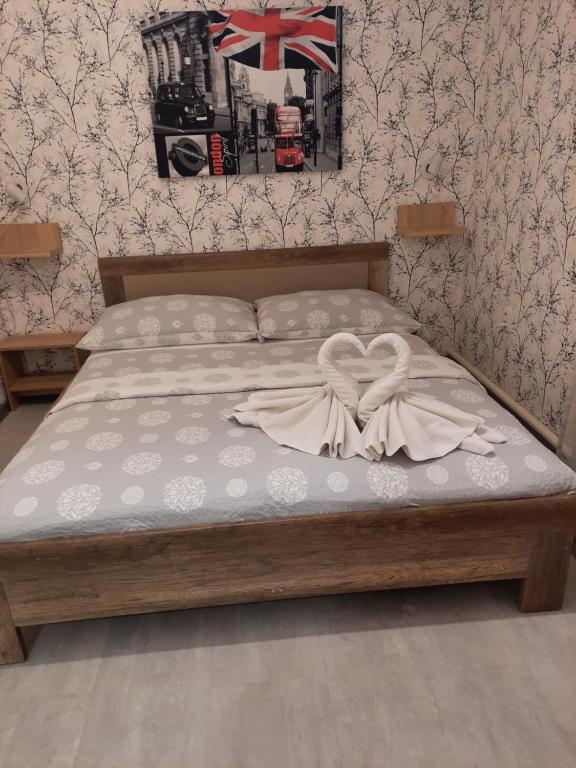 Łóżko lub łóżka w pokoju w obiekcie Hotel Boršičanka