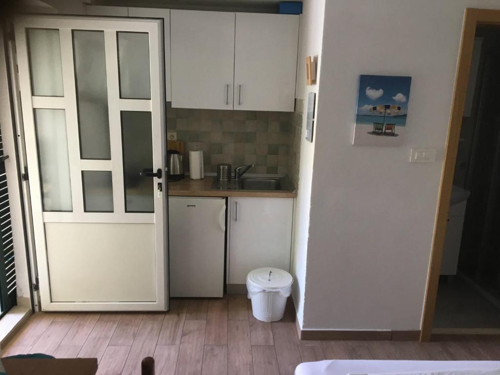 Kuchyň nebo kuchyňský kout v ubytování Apartments Marino Gojak