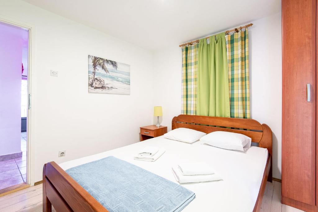 Letto o letti in una camera di Villa Flamingo