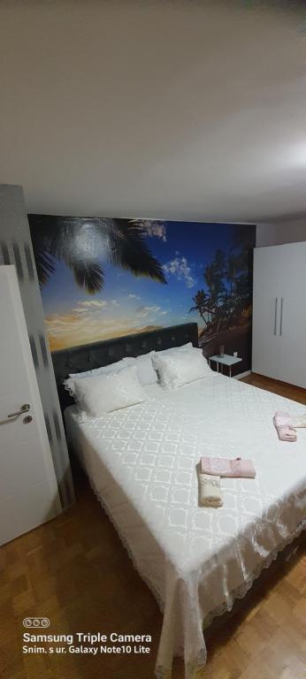 A bed or beds in a room at Apartments Jadra Omiš