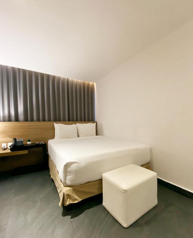 Postel nebo postele na pokoji v ubytování B's Suites Mérida