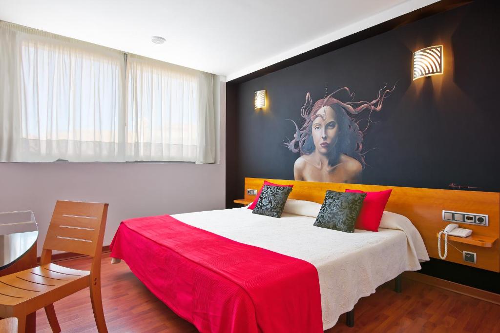 Postel nebo postele na pokoji v ubytování Hotel Plaza Inn