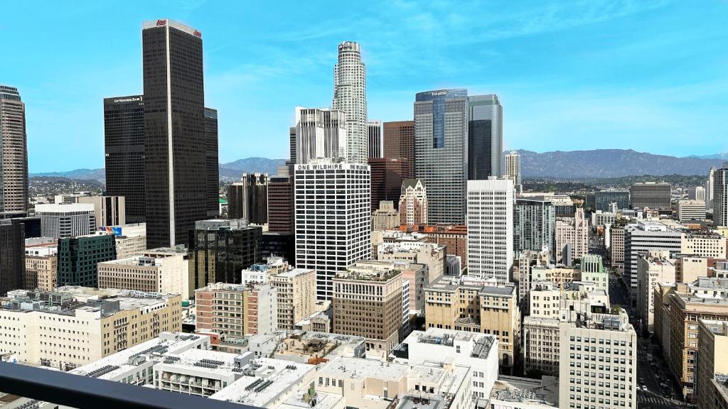 a view of a large city with tall buildings at Sky Rise Apartments in Los Angeles