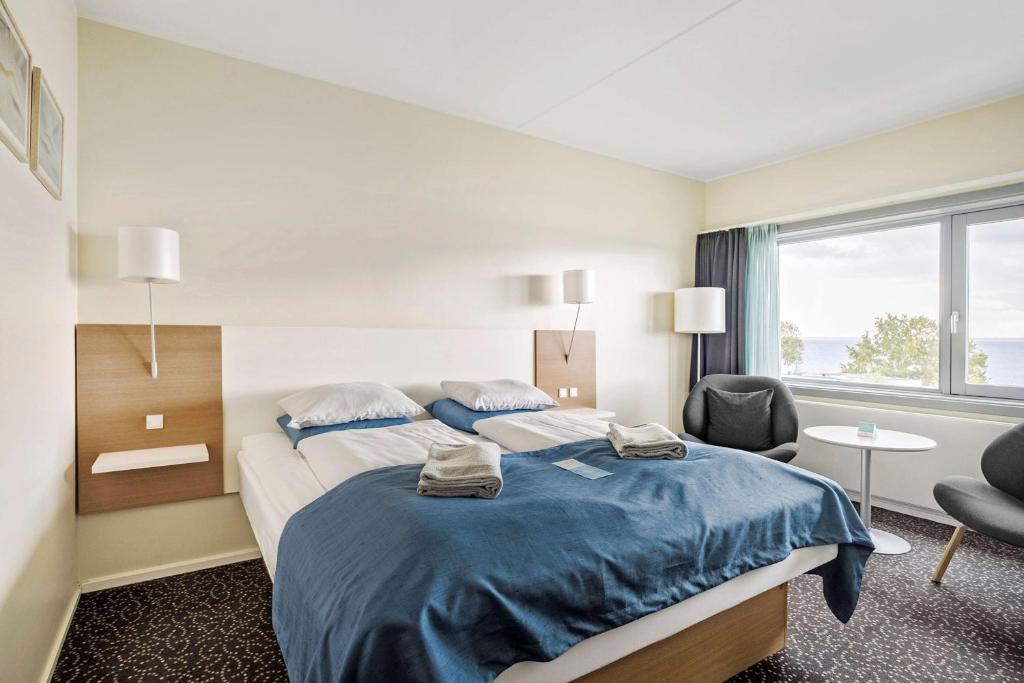 Una cama o camas en una habitación de Hotel Sonderborg Strand