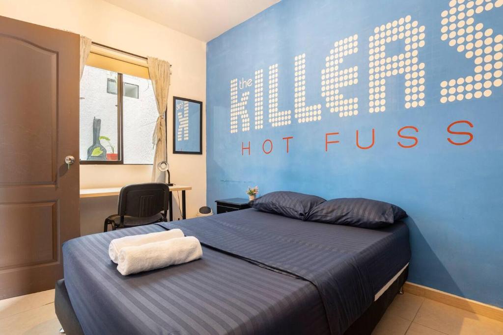 Postel nebo postele na pokoji v ubytování Casa Clandestina Guest House