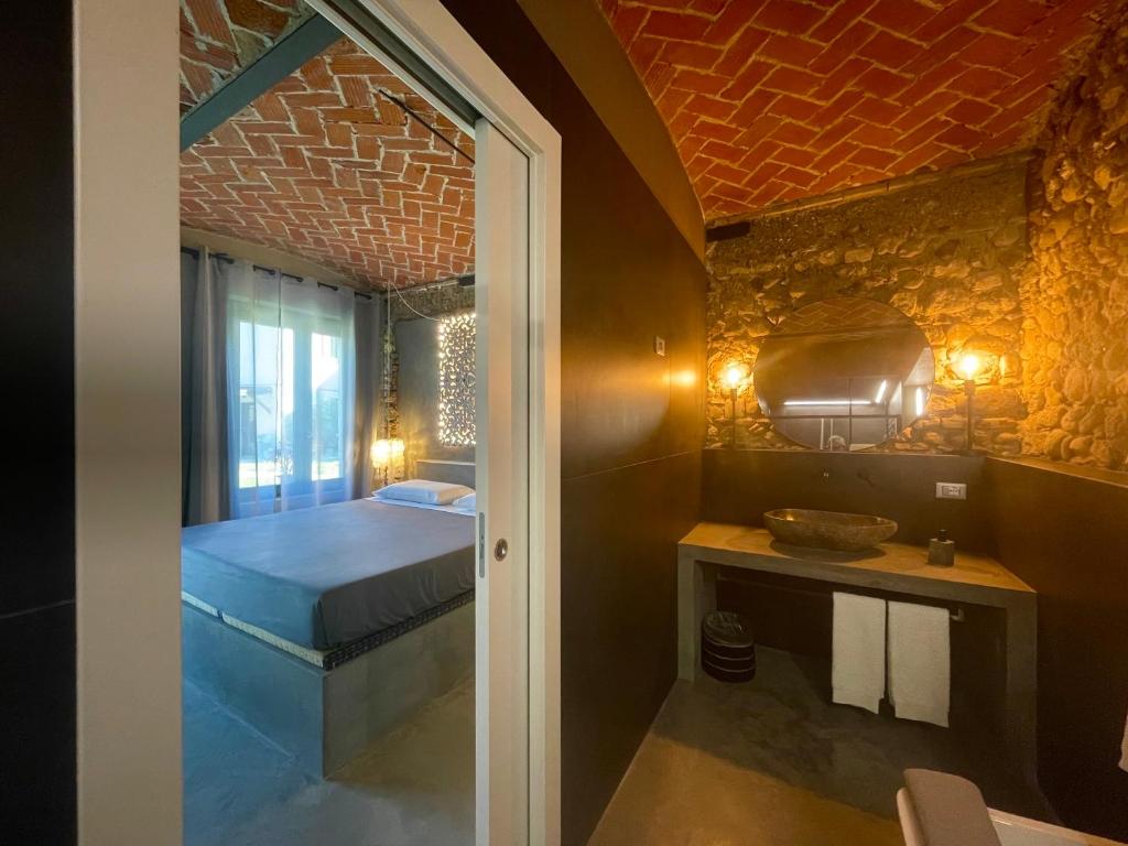 Postel nebo postele na pokoji v ubytování DeLax B&B - adults only