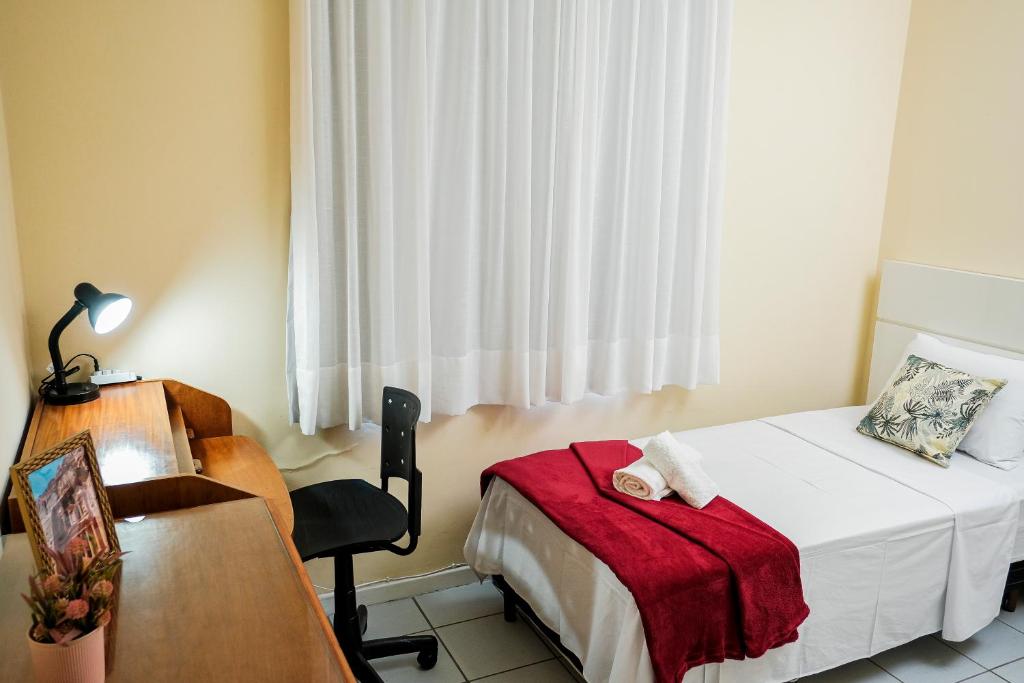 Postel nebo postele na pokoji v ubytování Praia da Costa 2 Quartos com Suite Clássico
