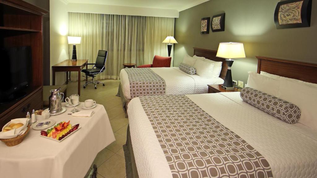 Postel nebo postele na pokoji v ubytování Crowne Plaza Panama by IHG