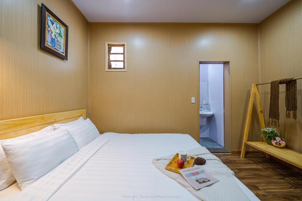Giường trong phòng chung tại Lam Vien Garden Villa - Homestay Da Lat