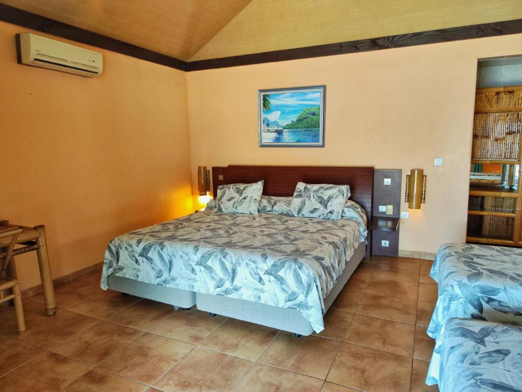 Postel nebo postele na pokoji v ubytování Hotel Kaveka