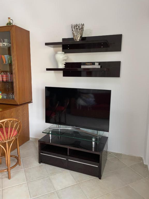 TV a/nebo společenská místnost v ubytování Fenia's house