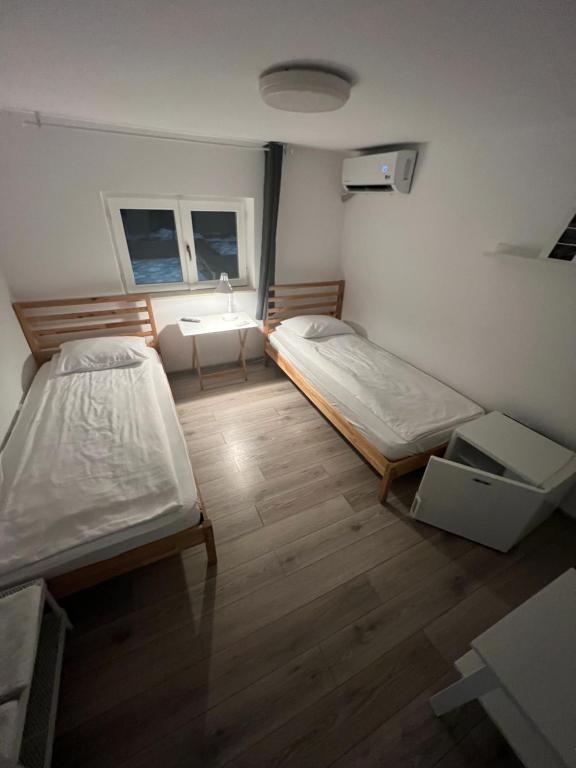 Postel nebo postele na pokoji v ubytování Pixel Guesthouse