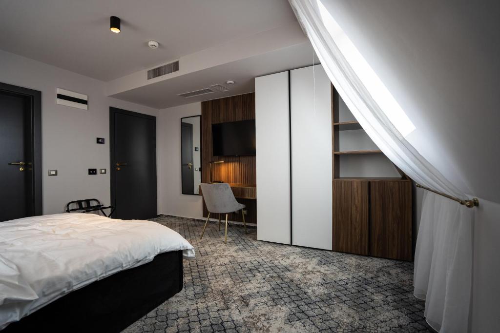 Postel nebo postele na pokoji v ubytování Hotel Cristal