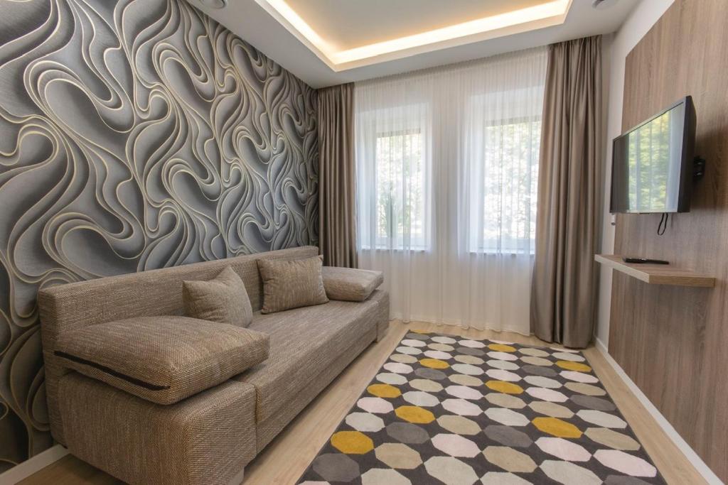 Telewizja i/lub zestaw kina domowego w obiekcie PontJó Apartman Miskolc