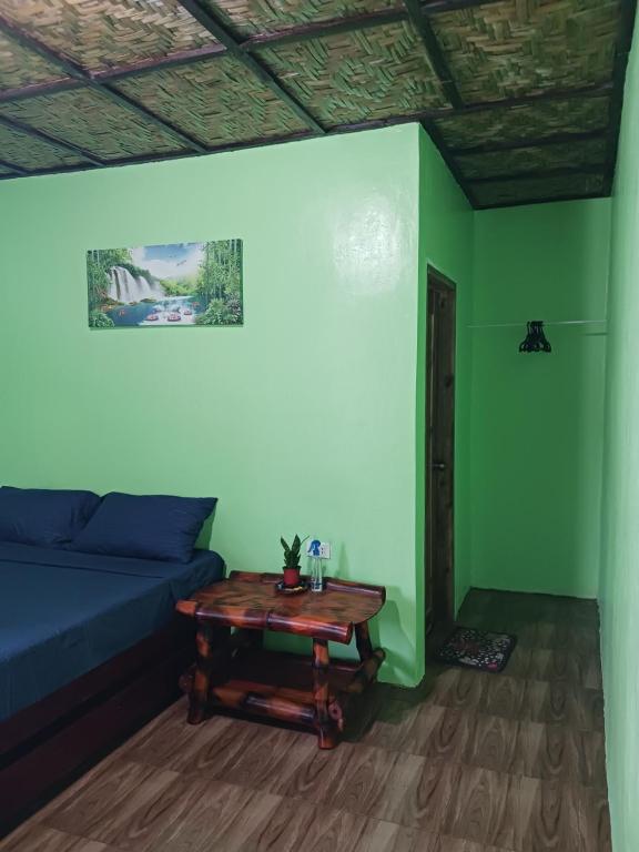 Posezení v ubytování Weeroona Huts Homestay Pacifico
