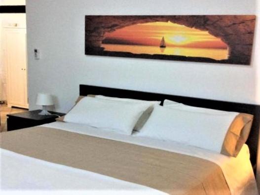 Postel nebo postele na pokoji v ubytování Le Terrazze di Salina, a 100 mt dalla spiaggia
