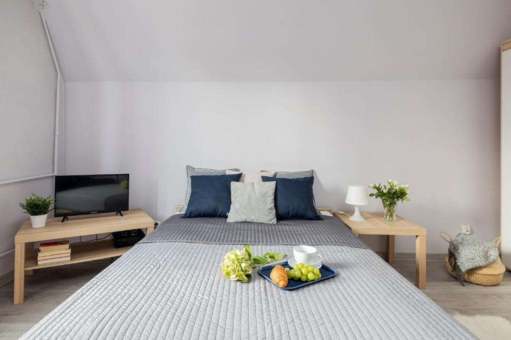 Posteľ alebo postele v izbe v ubytovaní Artus apartments