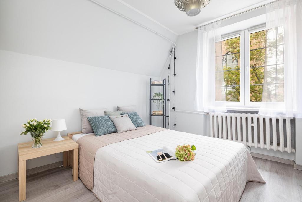 Posteľ alebo postele v izbe v ubytovaní Artus apartments