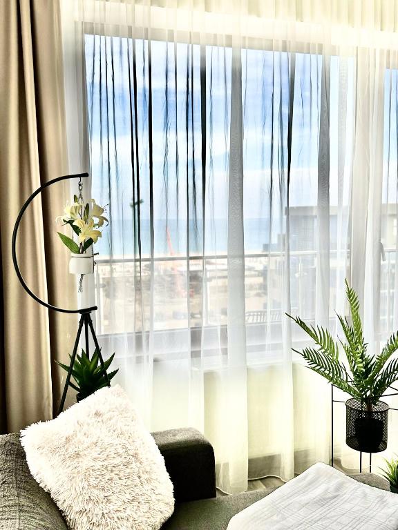 En eller flere senger på et rom på Aqua Vista NUBA - Vedere Top la Mare si Lac - Apartament 2 Camere Summerland - Mamaia