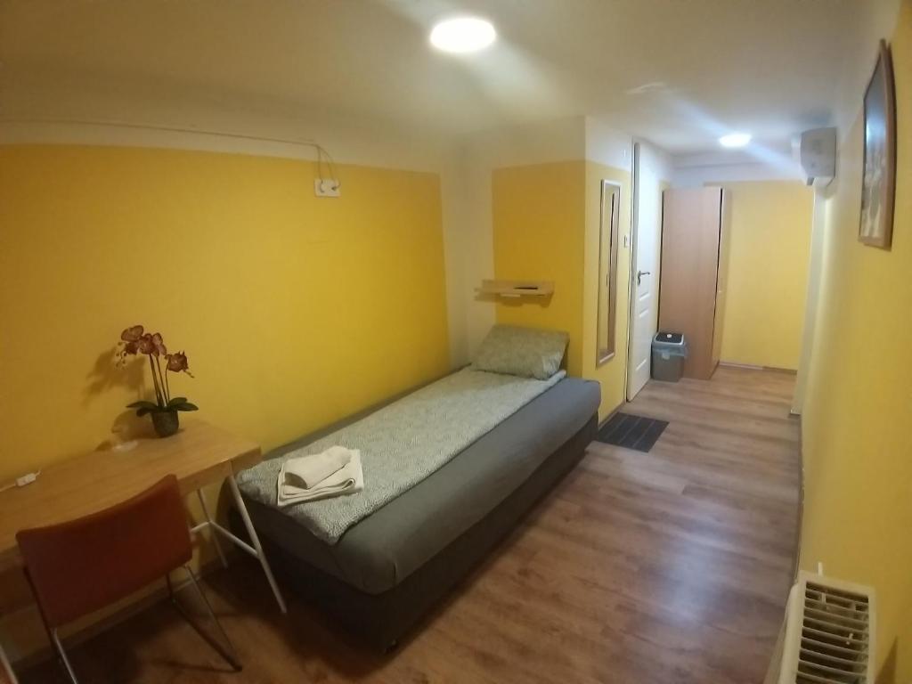 Postel nebo postele na pokoji v ubytování Deniz Guesthouse