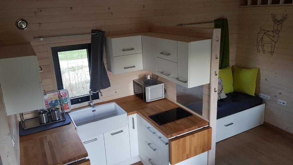 Kuchyň nebo kuchyňský kout v ubytování Le Domaine Des Anges, écolodge