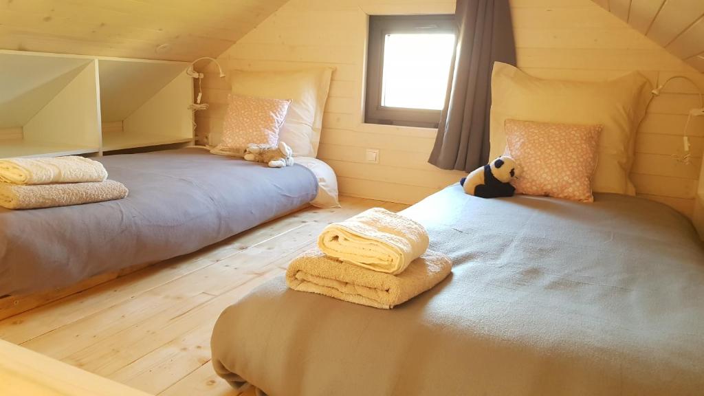 Postel nebo postele na pokoji v ubytování Le Domaine Des Anges, écolodge