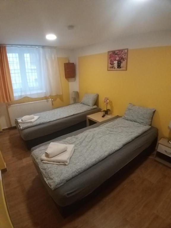 Postel nebo postele na pokoji v ubytování Deniz Guesthouse