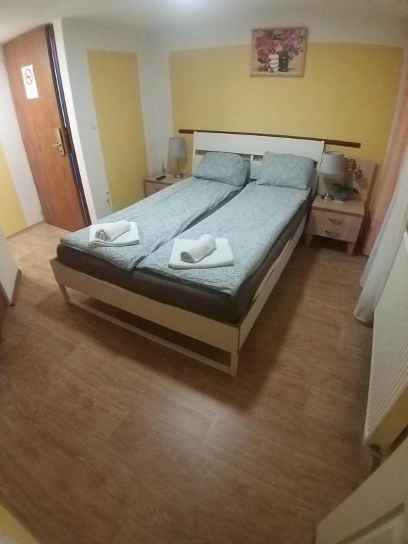 Postel nebo postele na pokoji v ubytování Deniz Guesthouse