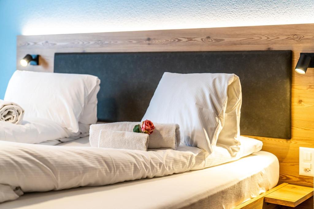 Postel nebo postele na pokoji v ubytování Hotel Kristall-Saphir Superior