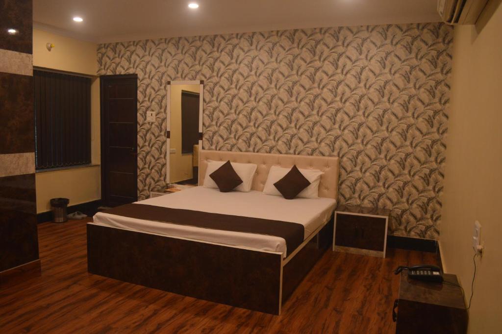 Postel nebo postele na pokoji v ubytování Hotel WB40