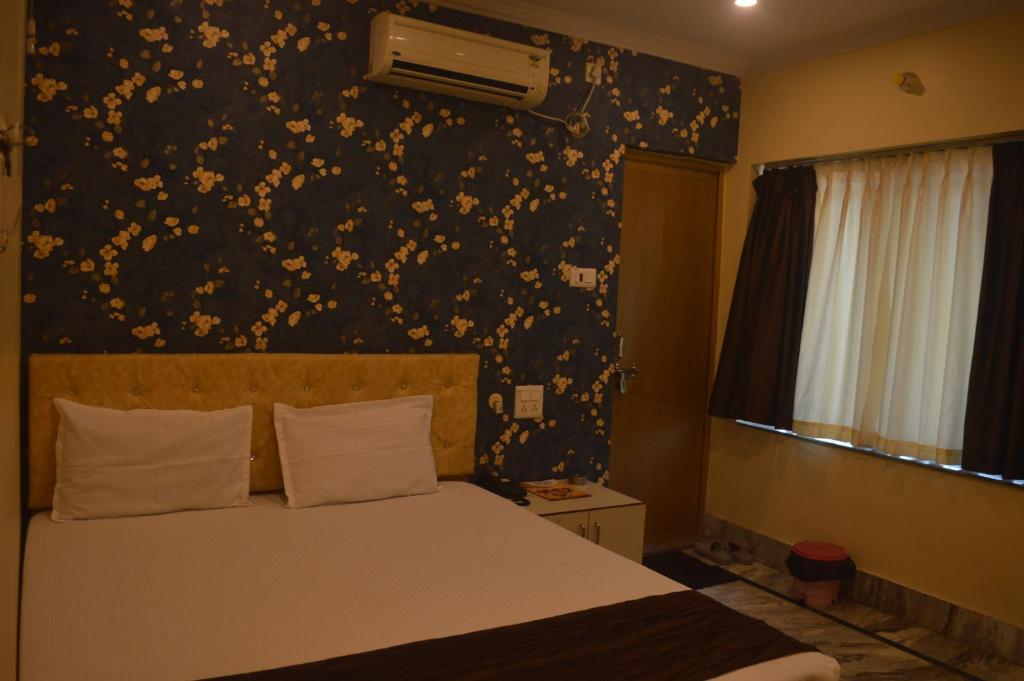 Postel nebo postele na pokoji v ubytování Hotel WB40
