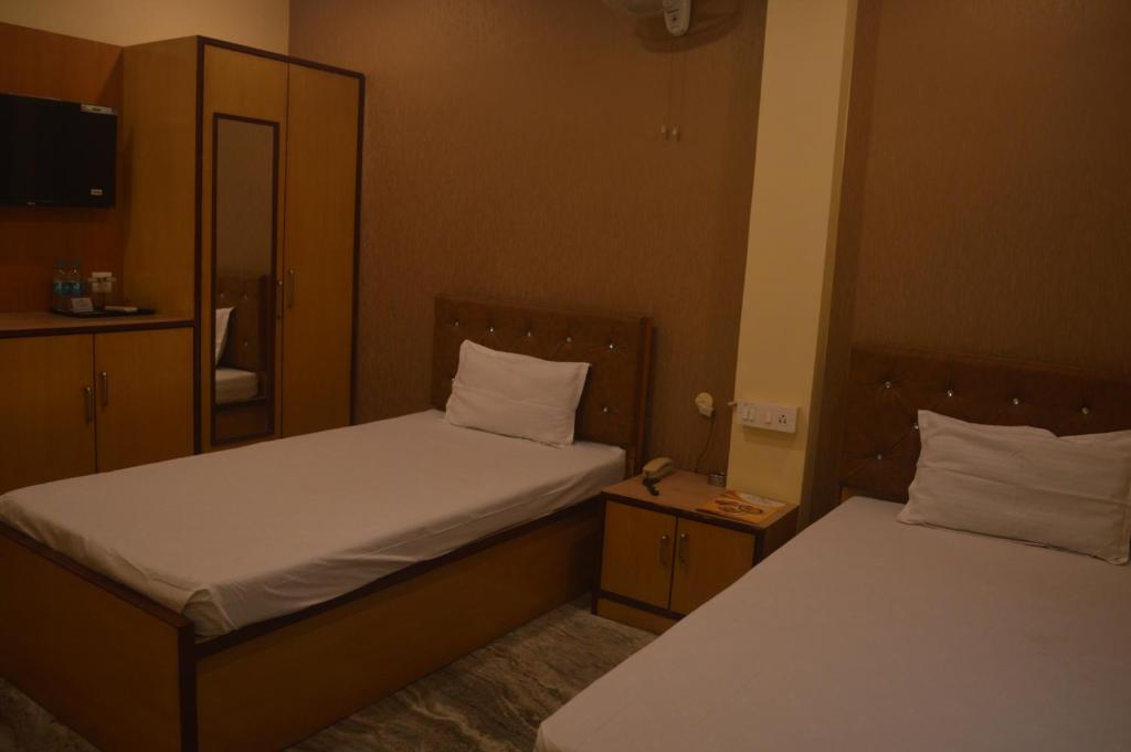 Postel nebo postele na pokoji v ubytování Hotel WB40