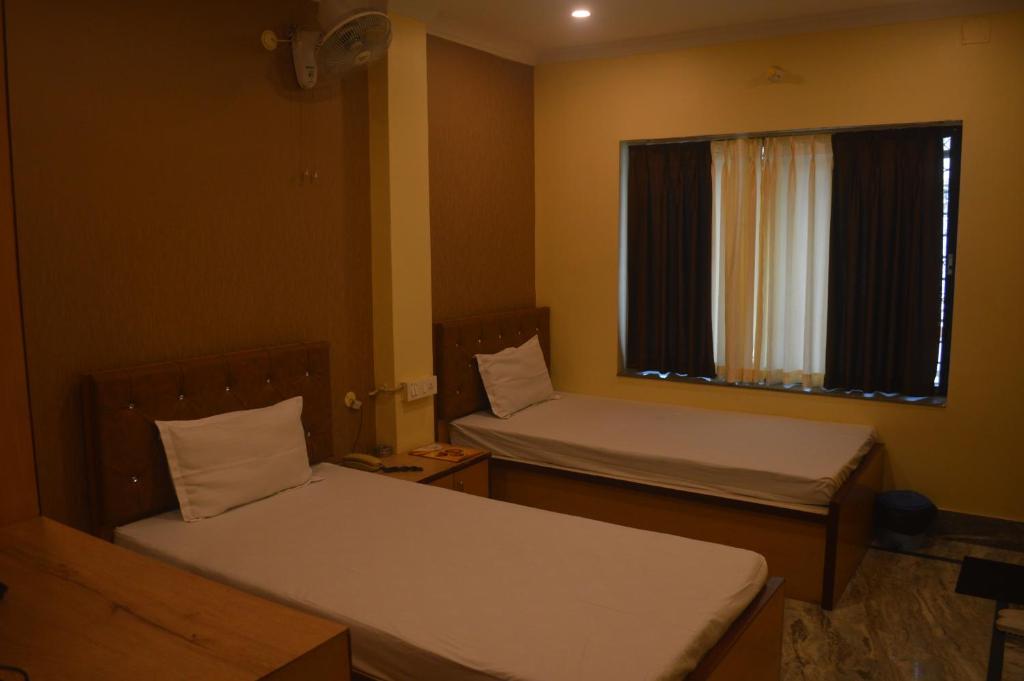 Postel nebo postele na pokoji v ubytování Hotel WB40