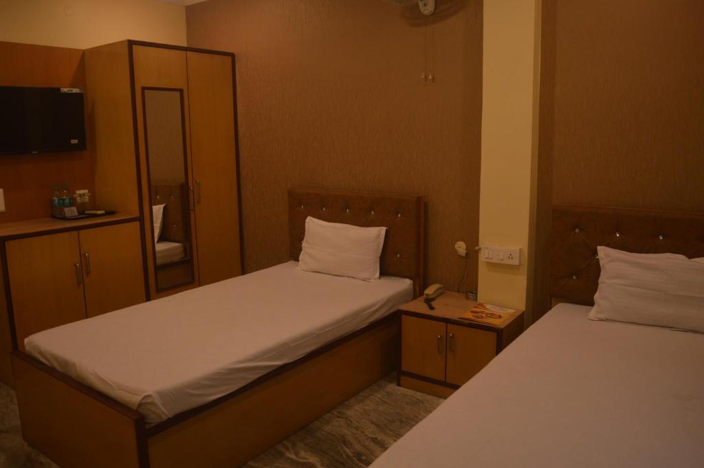 Postel nebo postele na pokoji v ubytování Hotel WB40