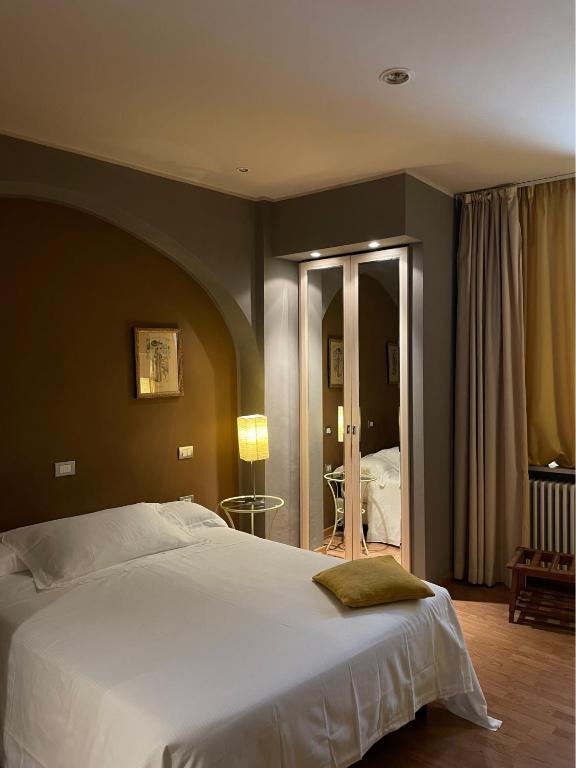 Postel nebo postele na pokoji v ubytování Albergo Ristorante Trieste Boves