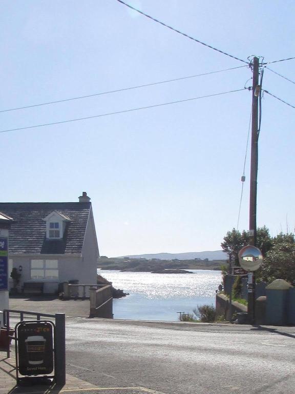 a view of a body of water with a house at Village Way Apartments in Kincasslagh
