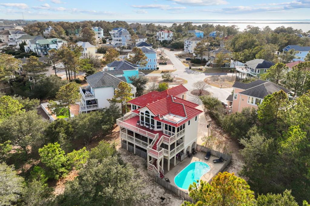 an aerial view of a house with a swimming pool at Sea Pride in Corolla