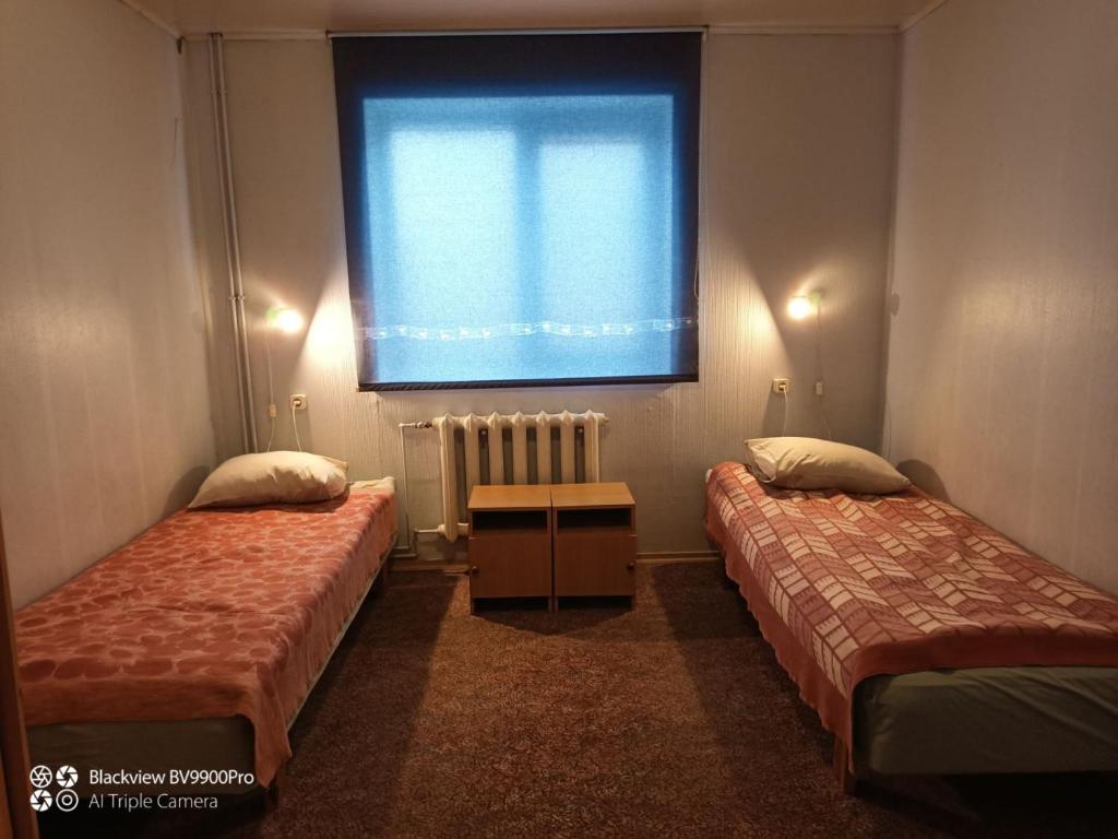 Postel nebo postele na pokoji v ubytování Tamme majutus